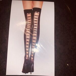 Thigh high black cut up back